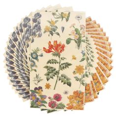 six napkins with flowers and leaves on them