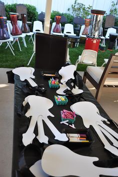 the table is set up with paper cutouts