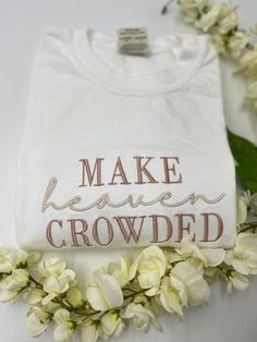 MAKE HEAVEN CROWDED Embroidered white Comfort Colors T-shirt,  embroidery t-shirts, Christian apparel, Christian Tshirt, Embroidered Christian tee 🎈WELCOME TO LoveStitchesCo If you are looking for soft, comfy, first-rate t-shirts, you're in the right place! Here at LoveStitchesCo, we love what we do and strive to make your shopping experience just right for you. If you have any questions, concerns, or comments about our products, feel free to shoot us a message anytime. Even on weekends and holidays, we'll try our best to respond as quickly as possible! 🎈 Embroidered Area Details - The design will be embroidered on a 7''x3.5'' area. 🎈Product Details Unisex T-Shirt: - Comfort Colors Brand - 100% cotton - Light/medium weight and extremely soft, this shirt is sure to be your next favorite White T-shirt With Embroidered Logo For Spring, White Crew Neck T-shirt With Floral Embroidery, White T-shirt With Machine Embroidery, Short Sleeve, White Crew Neck Tops With Machine Embroidery, White Letter Embroidery T-shirt For Spring, White T-shirt With Letter Embroidery For Spring, White Embroidered T-shirt For Spring, Spring White T-shirt With Custom Embroidery, White Embroidered Crew Neck T-shirt