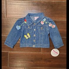 18 M Nannette Denim Embroidered Girls Jacket Featuring A Blue Denim Background With A Yellow Butterfly, Blue Bird, Red/Blue/Pink/Red Flowers Embroidered On The Front. New With Tags Jacket, Coat, Outerwear, Spring Break, Fall, Harvest, Winter, Layering Spring Cute Denim Jacket With Pockets, Cute Long Sleeve Denim Jacket For Spring, Cute Long Sleeve Denim Blue Outerwear, Cute Embroidered Long Sleeve Denim Jacket, Blue Cotton Denim Jacket For Playtime, Denim Blue Cute Spring Outerwear, Cute Denim Blue Spring Outerwear, Cute Medium Wash Denim Jacket For Spring, Cute Medium Wash Outerwear For Spring