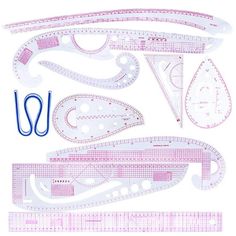 the paper model is shown with scissors, rulers and other items to make it look like they