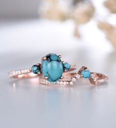 Turquoise Ring/Sterling Silver Turquoise Ring Set/December Birthstone Ring/Unique Stacking Ring/Vintage CZ Diamond Turquoise Wedding Ring Set/14K Gold Rings Vintage unique wedding set,perfect as engagement/wedding ring, birthday or anniversary gift, etc. Engagement Ring ❀gemstone is 6x8mm oval cut turquoise❀ ❀side stones are turquoise & cz diamond.❀ ❀925 Sterling Silver,Rose/White/Yellow Gold Plated❀ ❀14/18k Solid White/Rose/Yellow gold❀ Wedding Band ❀Round cut turquoise & CZ❀ ❀Curve hei Turquoise Vintage Promise Ring, Turquoise Rings With Gemstone Accents For Anniversary, Unique Turquoise Gemstone Ring For Wedding, Turquoise Oval Opal Wedding Ring, Heirloom Turquoise Ring For Anniversary, Vintage Turquoise Promise Ring, Turquoise Ring With Gemstone Accents For Anniversary, Turquoise Gemstone Ring For Anniversary, Unique Turquoise Wedding Rings