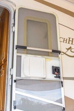 the inside of an rv with its door open