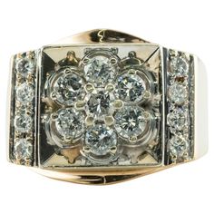 This amazing vintage ring for a gentleman is finely crafted in solid 14K Yellow Gold and White Gold for the top (tested and guaranteed) and set with white and fiery round brilliant cut diamonds. Seven diamonds in the center and eight more diamonds on the sides total .97 carat. These gems range from VS2 to SI2 clarity and H color. The top of the ring measures 16mm North-South. Size 6.25 and can easily be resized. This piece weighs 9.8 grams. Great vintage condition. Mens Diamond Ring, Edwardian Diamond Ring, Diamond Ring Vintage, Estate Rings, A Gentleman, Men Diamond Ring, Mens Band, White Gold Band, Vintage Band