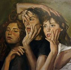 two women with their hands on their faces and one holding her head in the other's hand