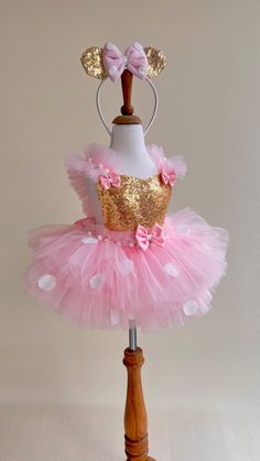 ✨ Introducing the Enchanting Pink Tutu Dress for Toddlers & Babies! ✨ Calling all loving mothers who want the best for their precious ones! Step into a world of magic with our stunning tutu dress. Perfect for birthdays, Halloween, festivals, trips, and everyday dress-up, this dress promises unforgettable moments and turns heads wherever your child goes. Our Dress combines cotton and sequin fabric for a stunning appearance that's both playful and comfortable. With an elastic waist and adjustable straps, it ensures a snug and flexible fit for your little one as she grows. 🎀 Handmade Magic: Every detail is carefully crafted with love. From the delicate ears (optional, available at extra cost) to the charming bows and playful polka dots, our dress sparks imagination and brings the joy of to l Toddler Tulle Dress, Minnie Mouse Birthday Outfit, Birthday Tutu Dress, Costume Princess, Princess Halloween Costume, Pink Tutu Dress, Mouse Dress, Pink Tutu, Girl Princess Dress