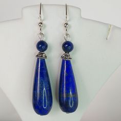 These Simple Drop Earrings Are Crafted From Sterling Silver And Natural Lapis Lazuli. They Are A Bit Heavy So They Are Mounted On "Perfect Balance" Sterling Earwres. This Style Earwre Helps Balance The Weight And Are Also More Secure! These Stones Are Not Dyed. They Measure About 1 1/8" From The Bottom Of The Earwre. Made With Love In Ca! #248 Patti I Lapis Earrings Blue Adjustable Long Drop Jewelry, Nickel Free Long Drop Blue Earrings, Blue Long Drop Wire Wrapped Jewelry, Blue Lapis Lazuli Earrings For Formal Occasions, Adjustable Hypoallergenic Blue Teardrop Earrings, Blue Adjustable Hypoallergenic Teardrop Earrings, Blue Hypoallergenic Adjustable Teardrop Earrings, Blue Sterling Silver Teardrop Pierced Earrings, Formal Blue Lapis Lazuli Earrings