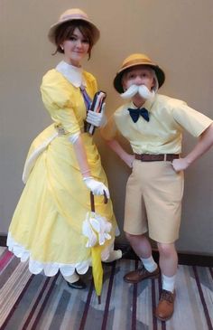 two people dressed in costumes standing next to each other