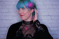 With a touch of silver and a splash of vibrant color, this necklace with 3D printed geometric flower pendant adds just the right wink of uniqueness to any look! (And just wait until you see it glow under blacklight!)This pendant necklace is printed with TPU filament, a flexible, translucent plastic, and printed on an Anet AM8 3D printer. The fine lines--each one less than a quarter of a millimeter thick--that make up each layer adds a dimension that makes them almost shimmer in light. And this l Handmade Geometric Jewelry For Party, Pink Geometric Jewelry For Gift, Geometric Pink Jewelry For Gift, Geometric Pink Jewelry For Gifts, Neon Pink Jewelry, Pink Geometric Jewelry For Gifts, Unique Nickel-free Flower Pendant Necklace, Abstract Flower Pendant, 3d Printed Pendant