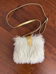 Faux Fur Mini Bag,Crochet Bag, Luxury Fox Fur Shoulder Bag, Handmade Shearling Bag,Luxury Plush Bag,Winter Fur Bag,Womens Fox Fur Bag This cute Faux Fur Bag has a Hard bottom. ⭐️It is lined inside. ⭐️Mini Bag is large enough to fit wallet, keys and lipstick. ⭐️Length 15 cm Width 17 cm You will love it very much. Please contact us for your questions and color options.❤️ Designer Handbag Storage, Mini Bag Crochet, Shearling Bag, Faux Fur Bag, Handbag Storage, Plush Bags, Women Purse, Fur Bag, Bag Luxury