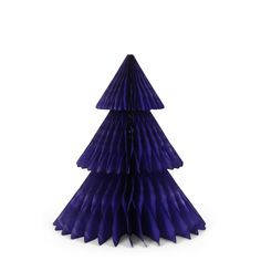 a blue paper christmas tree on a white background