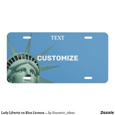 a license plate with the statue of liberty on it that says text customize,