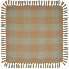 an orange and blue checkered rug with fringes on it's edges, against a white background