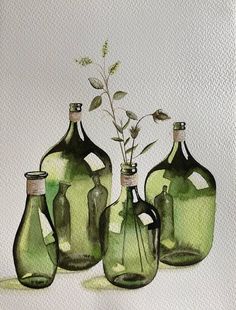 four green glass bottles with plants in them