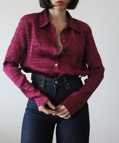 Vintage 90s deep cherry pleated shirt.  Mother of pearl buttons. Made in Italy. Excellent vintage conditions. Shoulder to shoulder 44 cm Bust 55 cm (X2) Length 64 cm Tag size 42 italian (10 uk). Best fit from 8 to 10 uk. Model's size 6/8 uk. Chic Pleated Button-up Blouse, Chic Party Tops With Covered Buttons, Vintage Long Sleeve Padded Blouse, Classic Pleated Tops For Fall, Vintage Padded Long Sleeve Blouse, Fall Pleated Collared Blouse, Fall Classic Pleated Tops, Fall Pleated Collared Tops, Classic Pleated Button-up Top