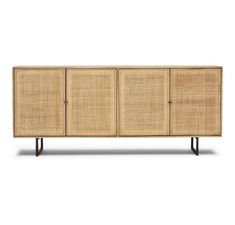 the sideboard with three doors and four legs, made out of rattan fabric