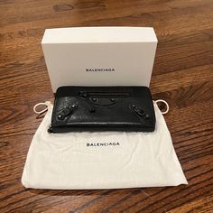 100% Authentic Black Balenciaga Anjulie Wallet Comes With Box And Dust Bag Designer Black Clutch With Zipper Closure, Designer Black Clutch For Daily Use, Designer Black Clutch Wallet, Black Wallets For Everyday Use, Designer Black Wallet With Zipper Closure, Designer Black Wallets With Zipper Closure, Black Balenciaga, Balenciaga Black, Bags Black