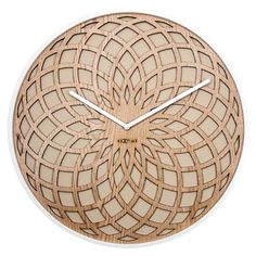 a clock made out of wood with an intricate design on the face and hands is shown