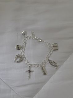 Here are my custom "Christ Charm Bracelets", each bracelet is handcrafted with 7 charms for completion, each charm is there to glorify Jesus and to personalize you bracelet each comes with initials for each person ordering! (We also have smalls and larges) White Gold Charm Bracelet, Christian Charm Bracelet, Charm Bracelet Silver, Bracelet Inspo, Gold Charm Bracelet, Jewelry Inspo, Bracelet Silver, Gold Charm, Charm Bracelets