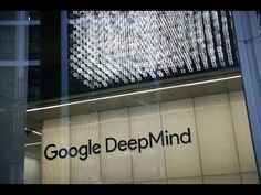 the google deep mind logo is reflected in a glass window at an office building on fifth avenue