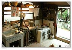 a kitchen with an oven, stove and sink