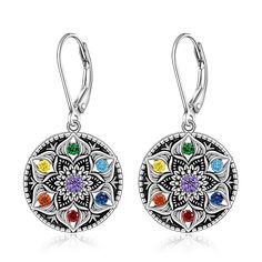 PRICES MAY VARY. [MANDALA EARRINGS] Chakras symbolise the seven energy points in the body and mandala represent the beauty of cosmos and creation. Outfit yourself with the mysteries of the universe when you wear these mandala earrings. [LOTUS FLOWER SYMBOLISM] The lotus flower is the eternal symbol of spiritual rebirth. An emblem of new beginnings, it can be a reminder of our own spiritual journey. [REFRESH YOUR SPIRIT] Mandalas aid in meditation, it is believed to enlighten the spirit and calm Lotus Flower Symbolism, Flower Symbolism, Eternal Symbol, Yoga Earrings, Shamrock Earrings, Mandala Earrings, Lotus Earrings, Chakra Jewelry, Crystal Drop Earrings