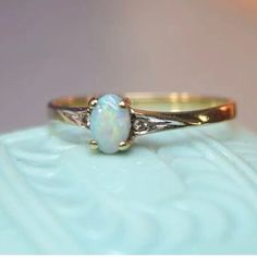 The Pictures Tell The Story! Lovely 14k Yellow Gold Ring With Prong Set Opal Gemstone Small Sparkling Diamond Set On Each Side Opal Is Filled With Color And Depth Stamped 14k Woman’s Size 6 Lightweight But Sturdy Feel Free To Ask Any Questions. Offers Always Welcome Take Very Good Care. Formal Yellow Gold Opal Ring With Round Cut, Gold Opal Ring Stamped 14k, Oval Gold Opal Ring In 14k Gold, Gold Classic Opal Ring For Formal Occasions, Hallmarked 14k Gold Opal Ring For Anniversary, Formal 14k Yellow Gold Opal Ring, Heirloom Gold Opal Gemstone Ring, Elegant Yellow Gold Opal Rings, Heirloom 14k White Gold Opal Ring