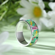 Add a serious dose of radiance to your outfit with splash of color! Bright and whimsical, the silver enamel band ring makes a statement with any outfit. Combine this trendy piece with other enamel pieces to vibrant and radiant effect. Enjoy the benefits of it, such as brining good luck and love, enhancing health and beauty.Weight: 5.84 gWidth: 7.2 mmHeight: 1.7 mmThickness: 1.6 mmMaterial: 925 SilverPlating Color: Silver Enamel Jewelry For Spring Gifts, Spring Enamel Jewelry For Gifts, Spring Enamel Jewelry As Gift, Hand Painted Jewelry As Spring Gift, Hand Painted Jewelry For Spring Gift, Spring Gift Enamel Jewelry, Spring Multicolor Hand-painted Jewelry, Multicolor Enamel Ring As A Gift, Unique Multicolor Enamel Ring