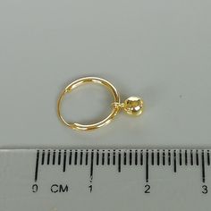 A PAIR of sterling silver hoops plated in gold. Comes with a tiny gold ball charm. Dimensions: Hoops 12 x 1 mm. Ball: 4mm Drop length: 15mm Price listed is for ONE PAIR These are made of 925 hypoallergenic sterling silver dipped in gold. Most of my pieces come with a 925 stamp. Can be packaged in a gift box. I can include a personal message from you if needed You are welcome to contact me at... bhavnakwintra1956@gmail.com For more beautiful pieces from my shop, please browse 👇 TOE RINGS: https: Hoop Charms, Earrings Minimalist, Bohemian Earrings, Sterling Silver Hoops, Gold Hoops, Toe Rings, Elegant Earrings, Silver Hoops, Minimalist Earrings