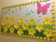 a bulletin board with yellow flowers and a butterfly on it that says happy mother's day