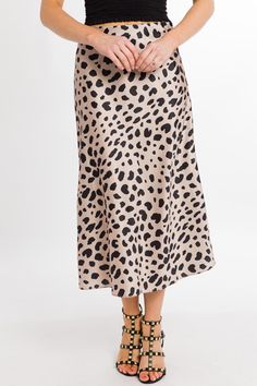 Elegant Leopard Print Lined Skirt, Chic Leopard Print Pencil Skirt, Chic Leopard Print Skirt, Elegant Leopard Print Skirt, Leopard Print Flowy Long Skirt, Flowy Long Leopard Print Skirt, Chic Leopard Print Midi Skirt, Long Flowy Leopard Print Skirt, Leopard Print Lined Bottoms With Relaxed Fit