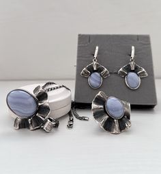 Handmade ring, earrings, and pendant with natural blue lace agate stone. Light blue stone jewelry set in high-quality sterling silver. The ring has an abstract flower design. The ring`s band is wide and comfortable to wear both every day and on special occasions.  This set can be a great gift idea for those who love unique, not mass-produced handmade jewelry made by the Shahinian family with great love! We can make the same design with other stones. Just feel free to message me for more details. Elegant Jewelry Sets With Natural Stones, Elegant Round Agate Jewelry, Elegant Rings With Matching Earrings For Gift, Elegant Rings With Matching Earrings As Gift, Elegant Agate Gemstone Jewelry, Elegant Formal Agate Jewelry, Elegant Blue Natural Stone Jewelry, Handmade Sterling Silver Jewelry Sets For Formal Occasions, Silver Jewelry With Natural Stones For Her