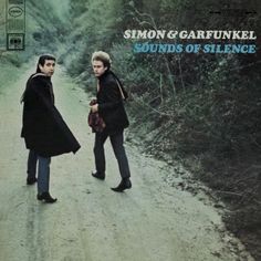 two people walking down a dirt road next to each other on the cover of simon and garfunkel's sounds of science