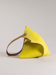 Wedge bag - Lemon yellow leather | scabbyrobot Chic Yellow Bags With Leather Lining, Modern Yellow Bag With Detachable Strap, Modern Yellow Shoulder Bag, Modern Yellow Shoulder Bag For Shopping, Modern Yellow Shoulder Bag With Removable Pouch, Modern Yellow Leather Shoulder Bag, Modern Yellow Shoulder Bag With Adjustable Strap, Yellow Rectangular Bag With Leather Lining, Yellow Bags With Leather Lining For Everyday Use