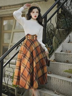 This luxurious Dark Academia Skirt is the epitome of classic dark academia sophistication and taste. Crafted from high-quality wool, its classic midi length and high waist create a flattering silhouette. The timeless plaid pattern and A-line silhouette add a touch of vintage 50s elegance. Skirt size S Waist: 66cm Length: 84cm Skirt size M Waist: 70cm Length: 85cm Skirt size L Waist: 74cm Length: 86cm Skirt size XL Waist: 78cm Length: 87cm Luxury High-waist Skirt For Fall, Luxury Feminine Fall Skirt, Skirt Knee High, Luxury Fall A-line Skirt, Luxury Full Skirt For Fall, Plaid A Line Skirt Outfit, Asian Woman Style Outfit, Retro A-line Winter Skirt, Sewing Midi Skirt