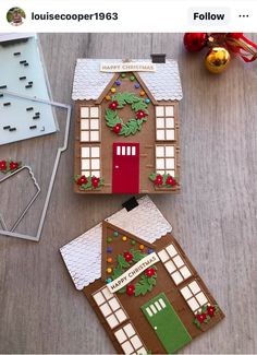 two gingerbread houses decorated with christmas decorations