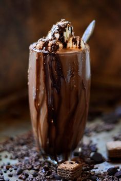 a glass filled with ice cream and chocolate