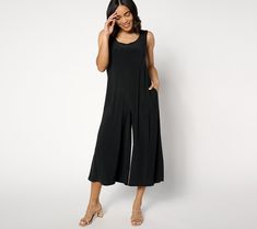 The easiest, chicest look in your summer getaway bag? This Attitudes by Renee® Collection sleeveless jumpsuit in stretchy, fluid, and practically wrinkle-resistant Como Jersey! Add a fab pair of sandals (or sneaks), a shiny chain, some oversized sunnies, or whatever floats your boat -- the cropped wide-leg style is the need-now blank canvas for your dream vacation or summer staycation. And, because smart pieces work overtime, it's office-ready with the simple addition of a blazer or cardi fr Versatile Sleeveless Jumpsuits And Rompers For Loungewear, Chic Stretch Summer Jumpsuits And Rompers, Versatile Summer Jumpsuits And Rompers For Loungewear, Versatile Sleeveless Jumpsuits For Spring, Versatile Spring Stretch Jumpsuits And Rompers, Versatile Sleeveless Jumpsuits And Rompers For Spring, Versatile Stretch Jumpsuits And Rompers For Spring, Spring Sleeveless Jumpsuits And Rompers, Versatile Sleeveless Jumpsuits For Work