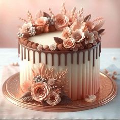 a white and pink cake with flowers on it sitting on a gold plated platter