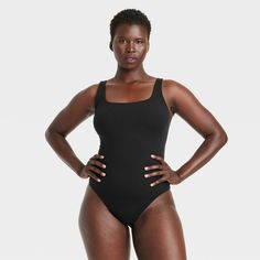 This 4-Way Stretch Tank Bodysuit from Auden™ in a solid color features a sleeveless silhouette with a breezy scoop neckline, cotton gusset for breathability and snap buttons on the crotch. Made from lightweight four-way stretch fabric it offers a comfortable fit that moves with you, and the opaque lining offers confident wear. You can wear this pullover bodysuit with everything from wide-leg trousers to joggers to shorts, and add layering pieces for versatile styling options. Auden™: Comfort tru Summer Sports Bodysuit With Scoop Neck, Summer Sports Scoop Neck Bodysuit, Solid Color Scoop Neck Tank Top With Lined Body, Solid Scoop Neck Tank Top With Lined Body, Sleeveless Cotton Bodysuit For Swimming, Solid Color Scoop Neck Bodysuit For Workout, Shipt Shopper, Tank Bodysuit, Black Xs