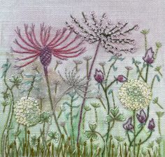 an image of some flowers and grass in the field with watercolors on paper