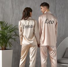 Custom Satin Pajamas for Couple, Mr and Mrs Custom Pyjamas, Wedding pjs, Groom and Bride Pajamas, Honeymoon gift, Anniversary gift- L+L 🌟About🌟     Satin is a popular fabric for couples' pajamas because it feels soft and silky against the skin. It also has a luxurious sheen that can add an elegant touch to your sleepwear.     Satin pajamas for couples come in a variety of colors and patterns to suit your taste. You might find classic black, white, or navy sets, or you might opt for something m Valentines Day Pajamas, Wedding Pjs, Different Colors Of Red, Pajamas For Couples, Bride Pajamas, Couple Honeymoon, Pijama Satin, Bride Pajama, Groom And Bride