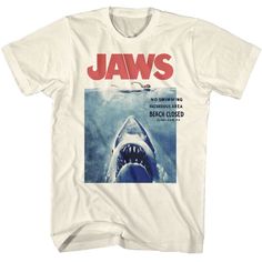 Embrace the Legend with the Officially Licensed JAWS T-ShirtDive into Nostalgia with Iconic StyleCapture the essence of the ocean's most legendary tale with our Officially Licensed JAWS T-Shirt. This isn't just a t-shirt; it's a tribute to the thrill, suspense, and unforgettable moments the classic JAWS movie delivered to audiences worldwide. Whether you're a die-hard fan or a lover of iconic cinema, wearing this tee is like carrying a piece of film history.Premium Quality for Ultimate ComfortCr Movie Graphic Tees, Movie Tshirt Designs, Men’s Graphic Tees, Jaws Tshirt, Jaws Shirt, Loser Core, Movie Tshirts, Swimming Design, Goofy Memes