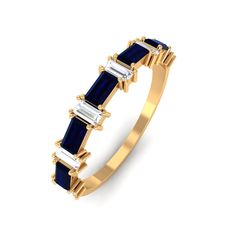 Product Details This Lab Created Blue Sapphire Half Eternity Ring features a prong setting with baguette cut lab created blue sapphire and Diamond accents on a semi eternity band made of gold. It will add a sparkling touch to any look. Product Information SKU SHP-RINGS0821237398 Width 3.5 mm Height 2 mm Weight 2.08 gm (Approximate) LAB CREATED BLUE SAPPHIRE INFORMATION No.of Stones 5 Pieces Total Weight 0.99 Carat (Approximate) Dimension(approx) Baguette-2X4 mm-5 Pcs Color Blue Cut Brilliant Shape Baguette Setting Type Prong-Setting Quality Grade AAAA DIAMOND INFORMATION No.of Stones 6 Pieces Total Weight 0.43 Carat (Approximate) Dimension(approx) Baguette-1.50X3.00 mm-6 Pcs Color HI Cut Brilliant Shape Baguette Setting Type Prong-Setting Quality Grade SI View More Product Parent Collectio Half Eternity Ring Diamond, Half Eternity Ring, 18k Yellow Gold Ring, Baguette Cut, Eternity Band, Eternity Bands, Yellow Gold Rings, Eternity Ring, Prong Setting