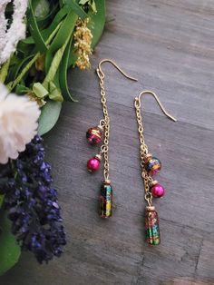 Shimmery Long Pink Turquoise and Gold Glass and Gold Filled Chain Dangle Earrings add a colorful bit of sparkle to any outfit!  Approximately 3 Inches Long Comes in Beautiful Satin Drawstring Gift Bag Perfect for Gift Giving! Drawstring Gift Bag, Dangle Earrings Boho, Sparkly Earrings, Long Dangle Earrings, Earrings Pink, Earrings Unique, Pink Turquoise, Pink Earrings, Gold Glass