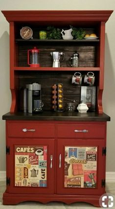 a red hutch with many different items on the top and bottom shelf above it