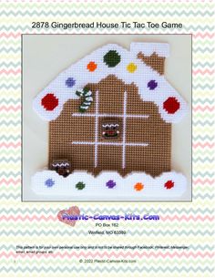 the gingerbread house is made out of cross stitch