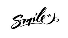 the word smile written in cursive writing on a white background with black ink