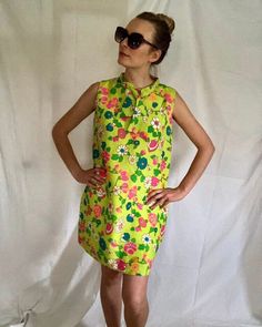 Groovy vintage dress from the 60's or 70's. Zipper up to button in back, tie neck collar. Size on tag is 16.5, but garment runs closer to an 8/10. I'm happy to take any measurements upon request. Retro Collared Mini Dress For Summer, Retro Daywear Dresses With Retro Print, Retro Print Dresses For Daywear, Retro Collared Mini Dress For Spring, Green Retro Vintage Dress, Green Sleeveless Retro Vintage Dress, Retro Green Vintage Dress For Daywear, Retro Green Lined Vintage Dress, Vintage Collared Dress For Parties