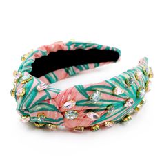 Add a touch of tropical paradise to your outfit with this beautiful Twine and Love hand-sewn top knot headband! Made from stunning blush pink and green fabric, this headband is adorned with light pink and green jewels that add an extra touch of glamour. Each piece is handcrafted with care, making it a gorgeous and unique accessory to elevate any look. Stand out from the crowd with this eye-catching headband that combines style and craftsmanship perfectly! One size fits most. Size 2" Wide  Twine Pink And Green Fabric, Top Knot Headband, Top Knot Headbands, Knotted Headband, Headband Styles, Knot Headband, Tropical Paradise, Top Knot, Green Fabric